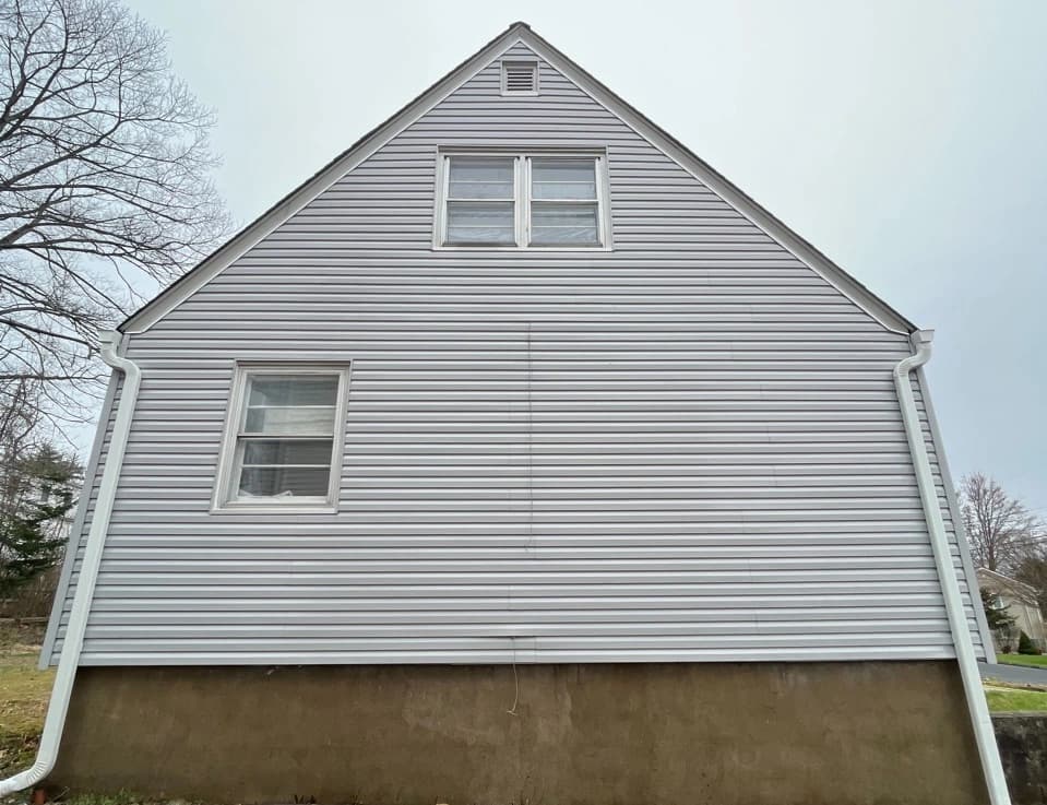 East Cleveland Power Washing technician performing detailed house washing in East Cleveland residential area