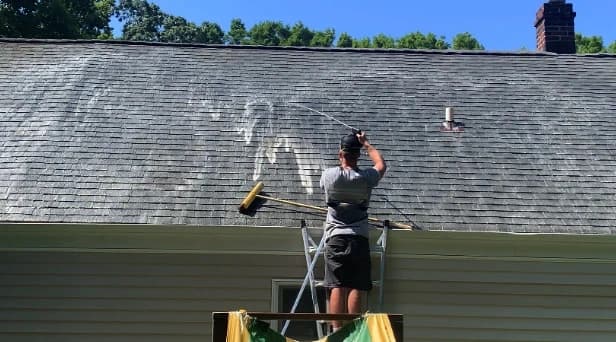 Before and after results of roof washing by East Cleveland Power Washing in East Cleveland